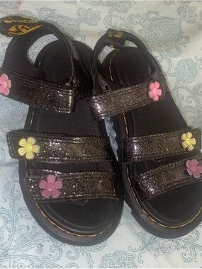 Dr. Martens Black Glitter Kids Sandals with Pink & Yellow Flower Accents
